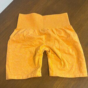 NVGTN Orange Biker Shorts